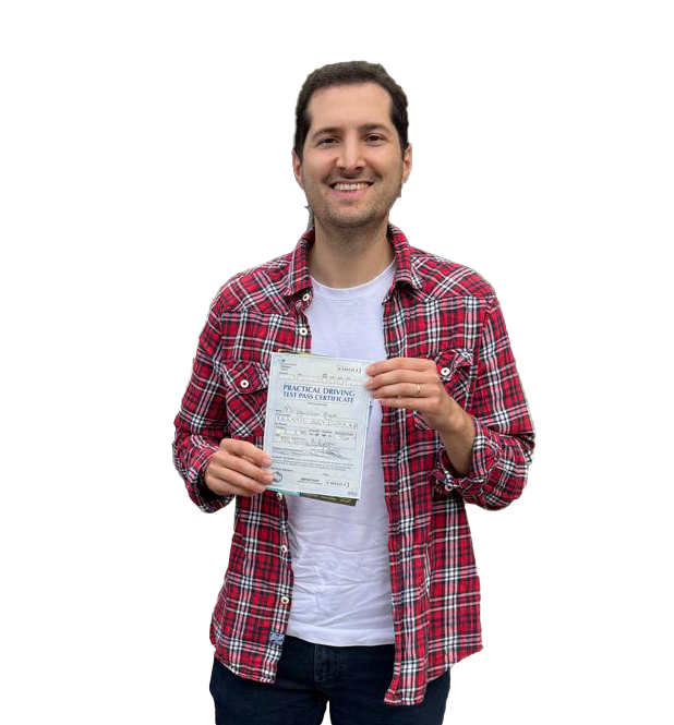 Successful student holding certificate after crash course driving lessons in Fulham with expert instructors from Admire Driving School.